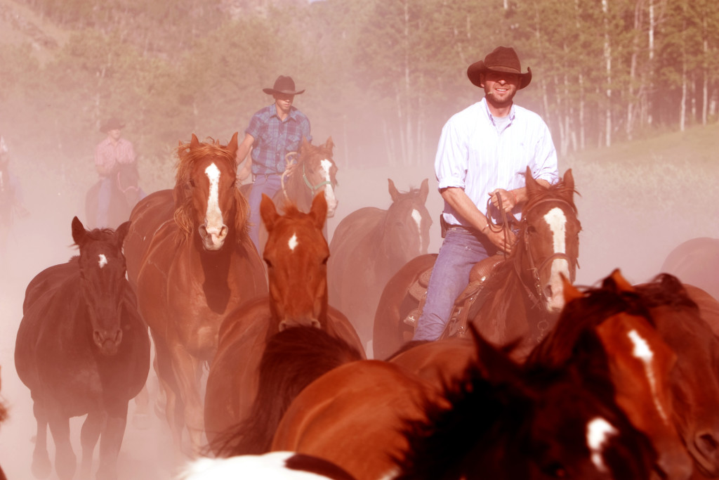 Family ranch holiday. Taking horses to the south pasture Wyoming ranch. Copyright©2015 reserved to photographer. Contact mapandfamily.com