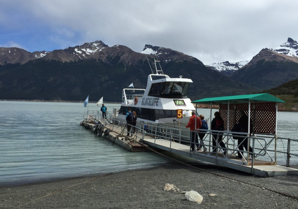 boat with mountains behind. Copyright©2015 reserved to photographer. Contact mapandfamily.com