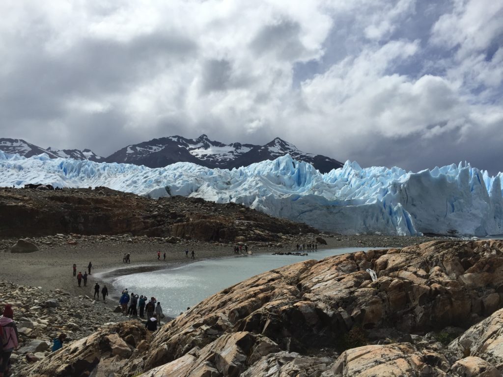 Walking along waters edge to glacier. Copyright©2015 reserved to photographer. Contact mapandfamily.com