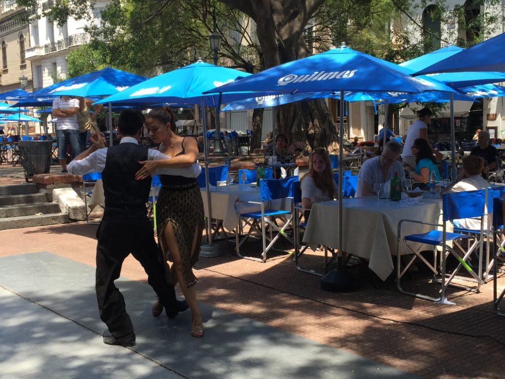 Argentina family holiday. Tango dancers in the street, San Telmo. Copyright©2015 reserved to photographer. Contact mapandfamily.com