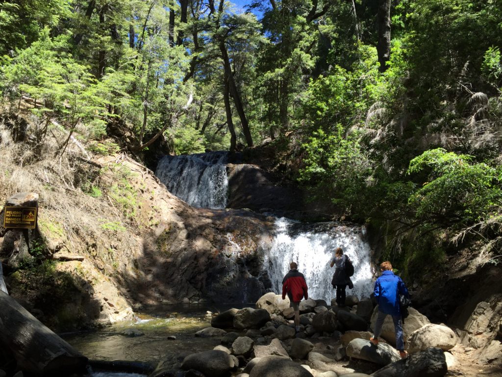 Family trip Argentina: at waterfall in Bariloche. Copyright © 2015 reserved to photographer. Contact mapandfamily.com