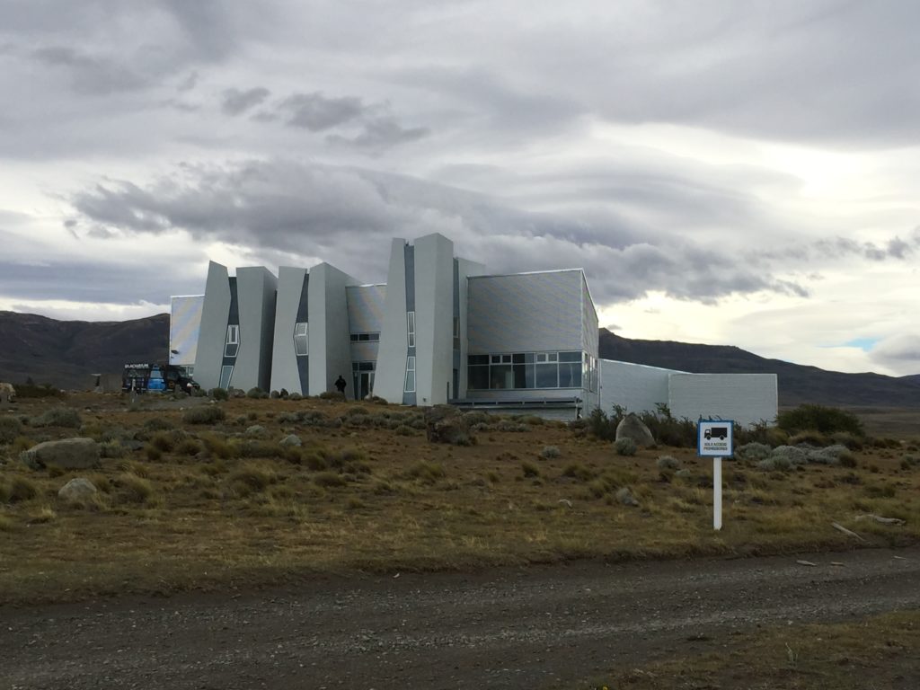 Modern white building in stark landscape. Copyright©2015 reserved to photographer. Contact mapandfamily.com