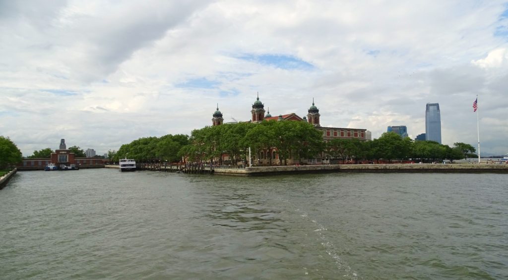 New York sightseeing with teens. Ferry leaving Ellis Island Copyright©2015 reserved to photographer. Contact mapandfamily.com