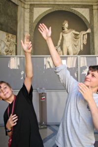 First time in Rome: visit the Vatican. Two boys copying Apollo statue. Copyright©2016 reserved to photographer via mapandfamily.com