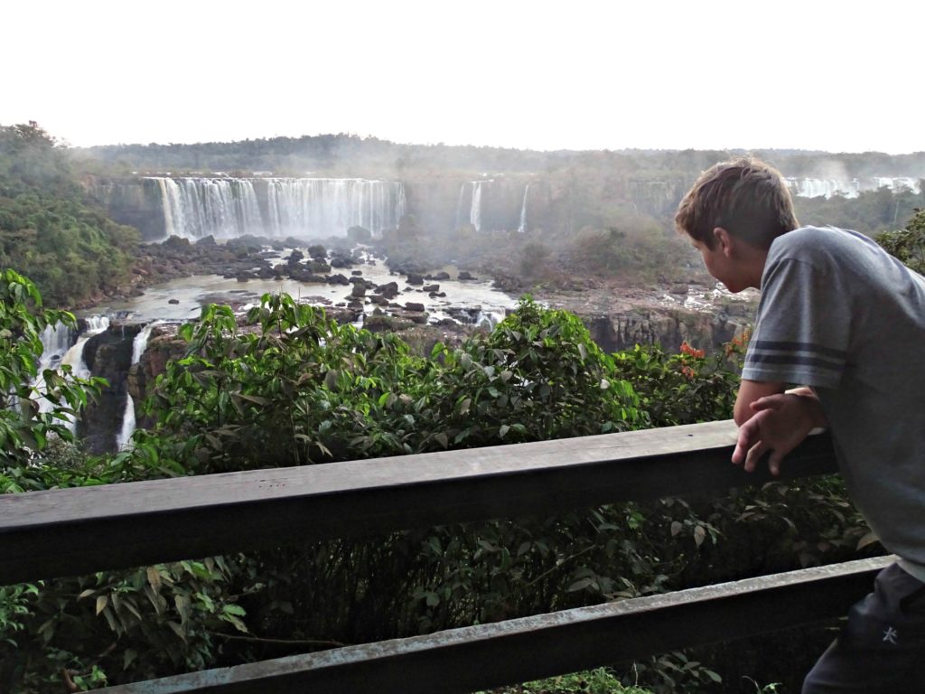 Family holiday Iguacu falls walkway in Brazil park. Copyright©2016 reserved to photographer via mapandfamily.com