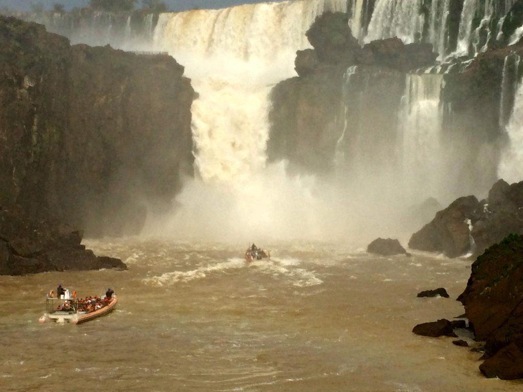 Family holiday Iguacu falls boats viewing falls. Copyright©2016 reserved to photographer via mapandfamily.com