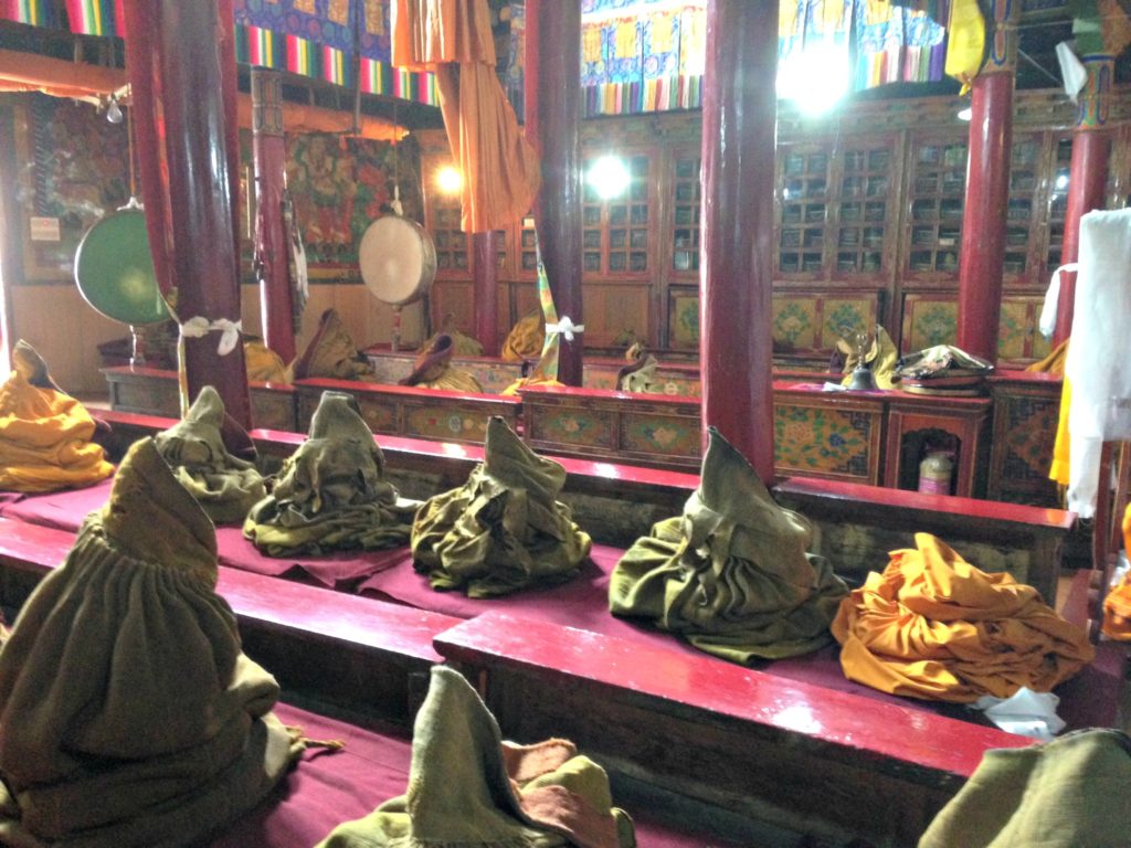 Ladakh family trip robes in monastery. Copyright©2017 reserved to photographer via mapandfamily.com