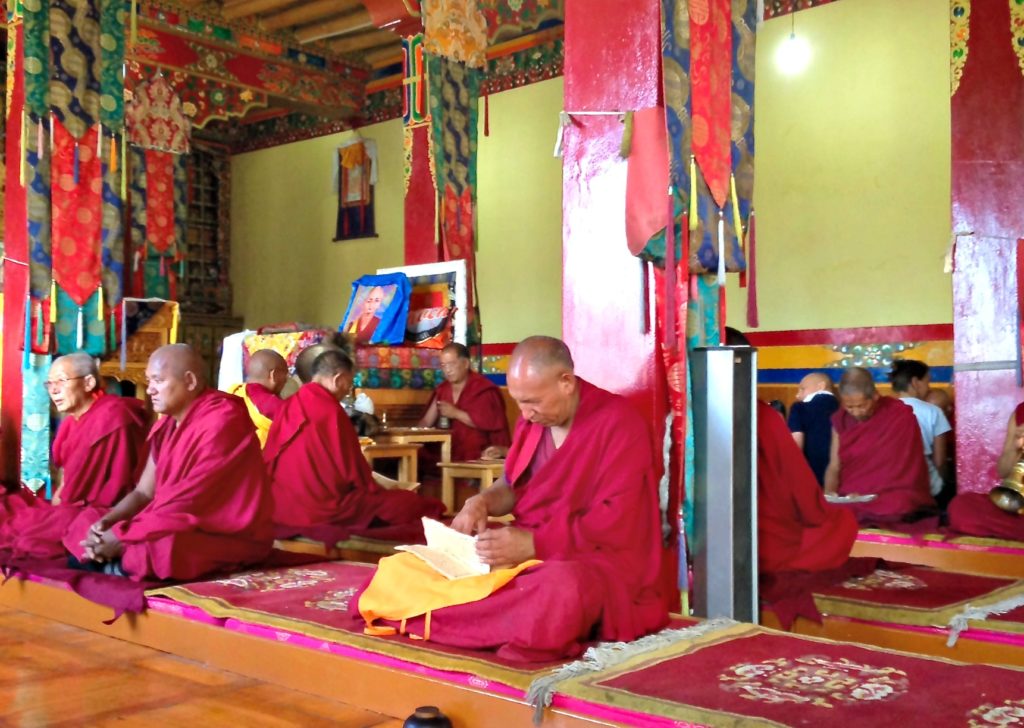 ladakh family trip monks in red robes Copyright©2017 reserved to photographer via mapandfamily.com