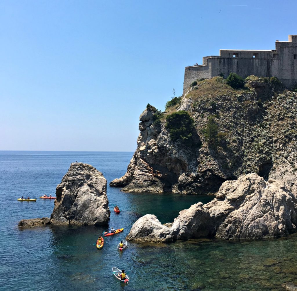 Things to do in Dubrovnik kayaking in sea near fort. Copyright©2017 reserved to photographer via mapandfamily.com