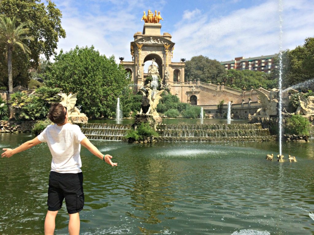 plan a holiday with teenagers: boy in fountain spray Copyright©2017 reserved to photographer via mapandfamily.com 