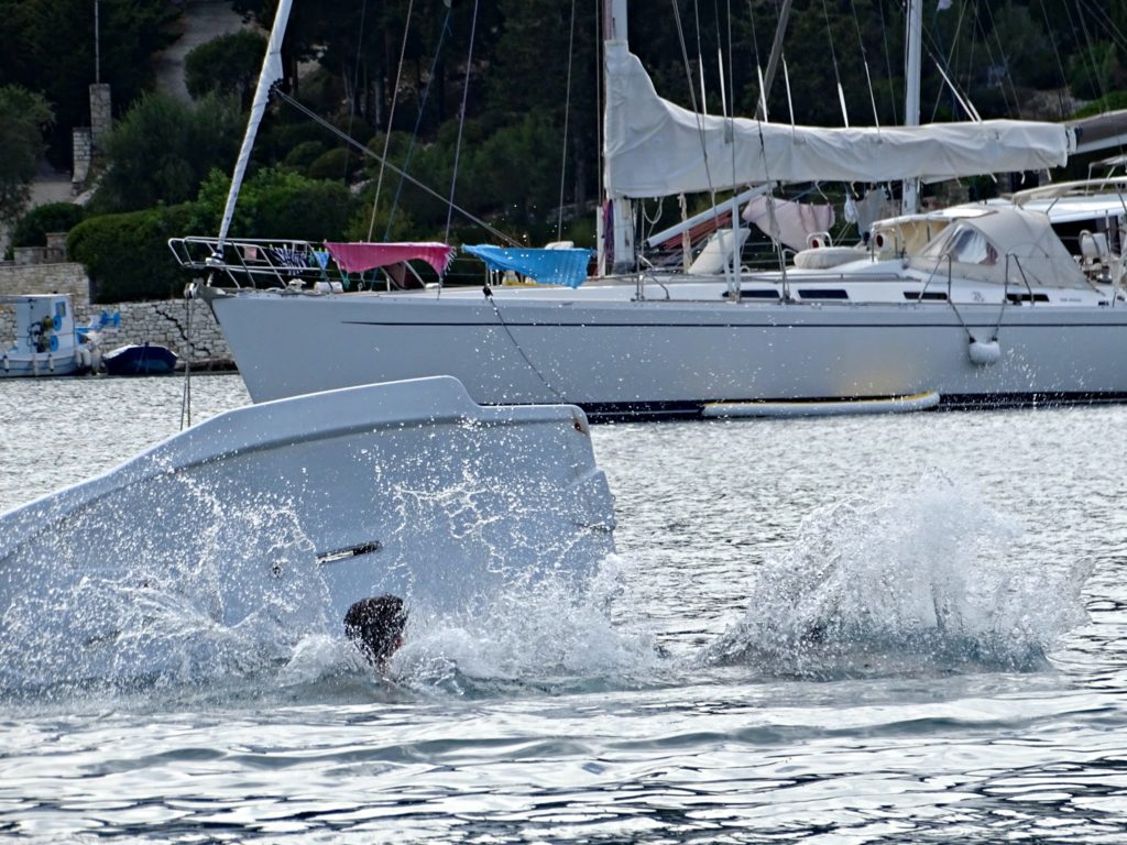 Paxos holidays, falling off paddleboard in Morgonissi Copyright©2017 reserved to photographer via mapandfamily.com 