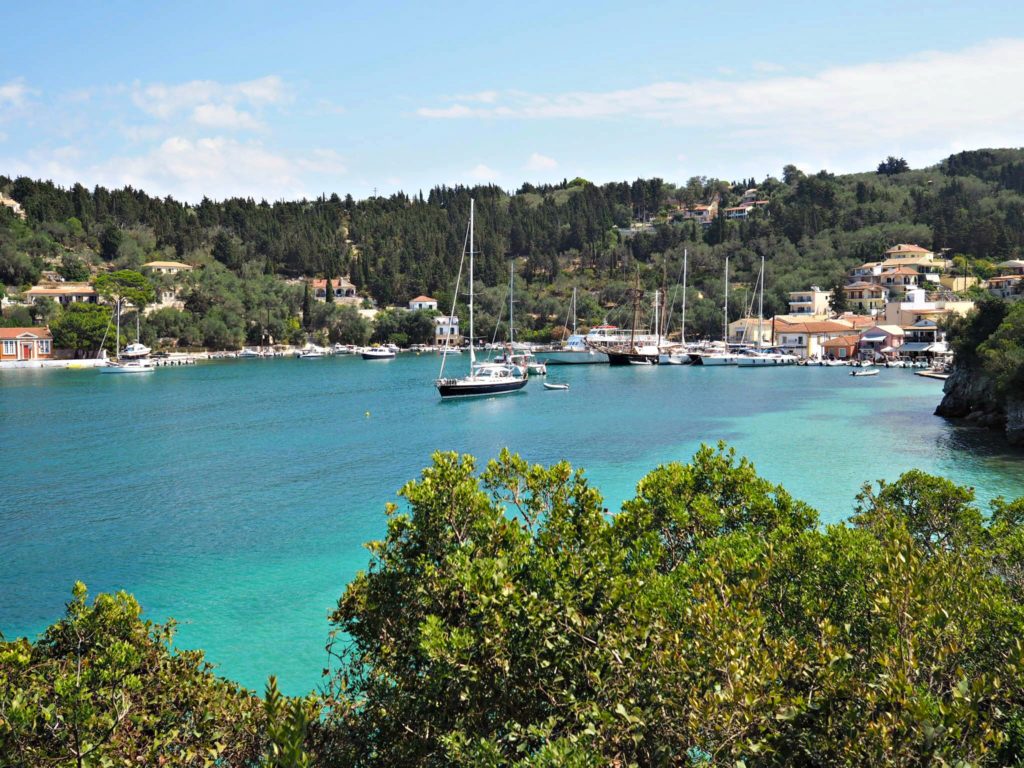 Paxos Greece, turquoise waters of Lakka bay Copyright©2017 mapandfamily.com 