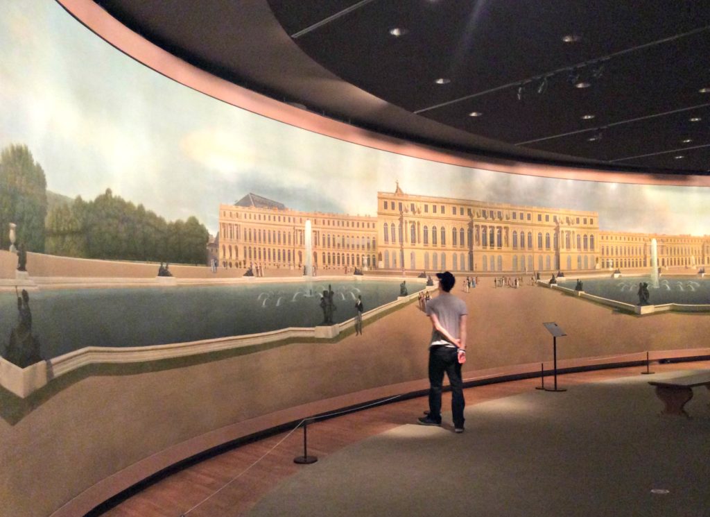 Is the New York CityPASS worth it? At the Metropolitan Museum of Art, boy looking at a panorama painting