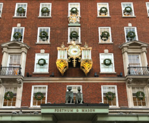 Ornate clock on exterior of Fortnum and Mason's store. Copyright ©2018 mapandfamily.com 