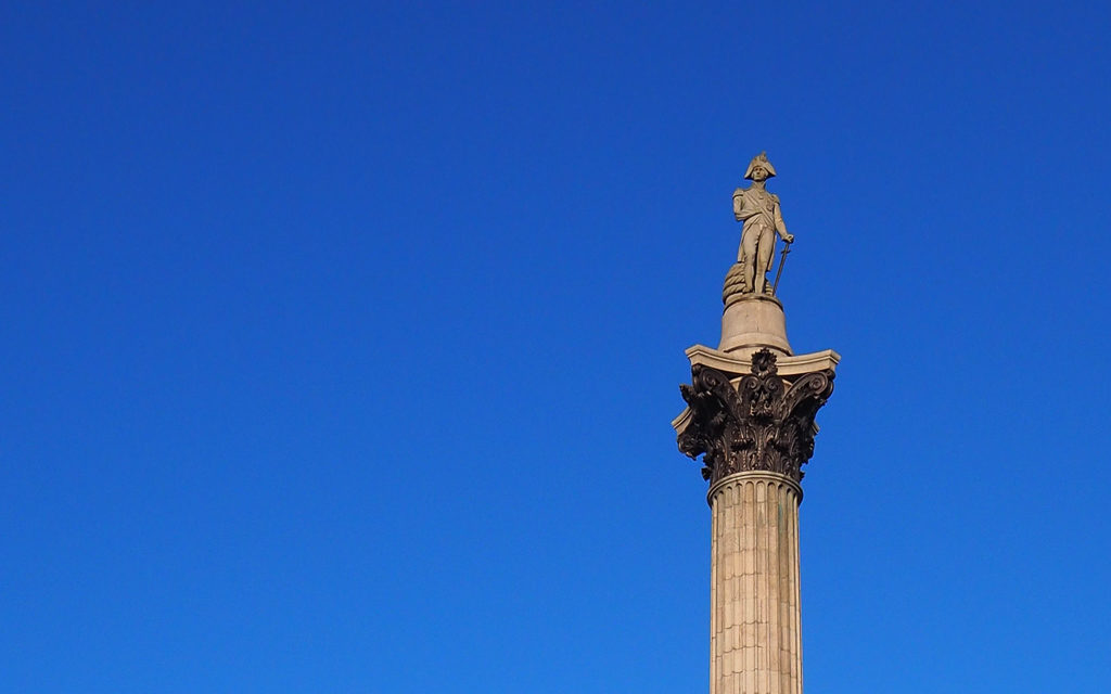 Statue of Nelson at top of column in Trafalgar Square London. Copyright ©2019 mapandfamily.com 