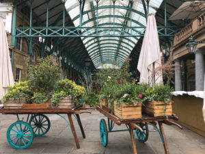 Decorated carts in entrance to Covent Garden. Copyright ©2019 mapandfamily.com 