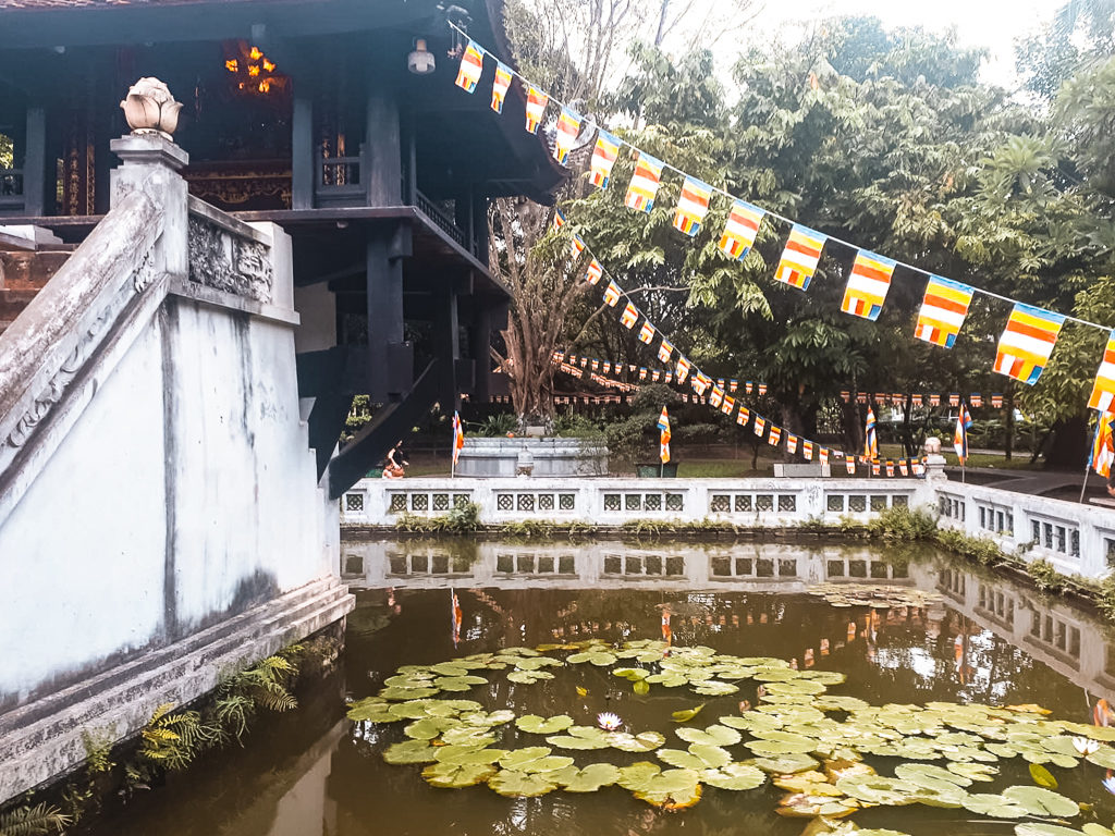 3 weeks in Vietnam. A pagoda with a single central support overlooking a lotus pond. Copyright ©2019 mapandfamily.com