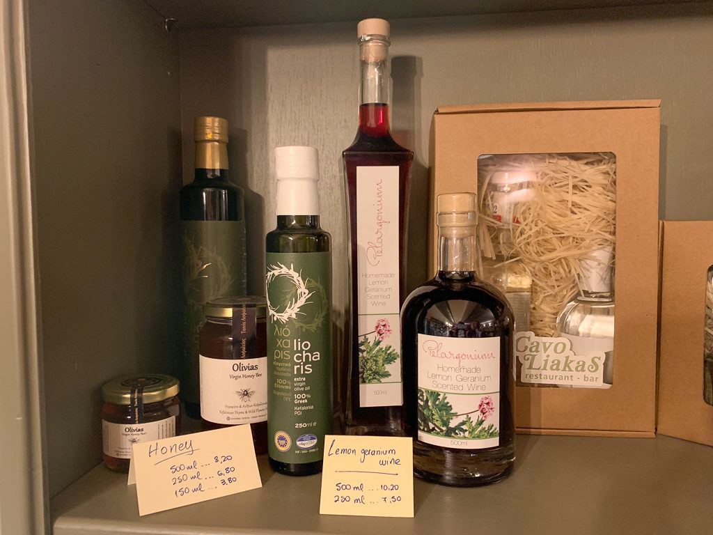 Bottles of olive oil and homemade wine for sale in restaurant. Copyright ©2019 mapandfamily.com 