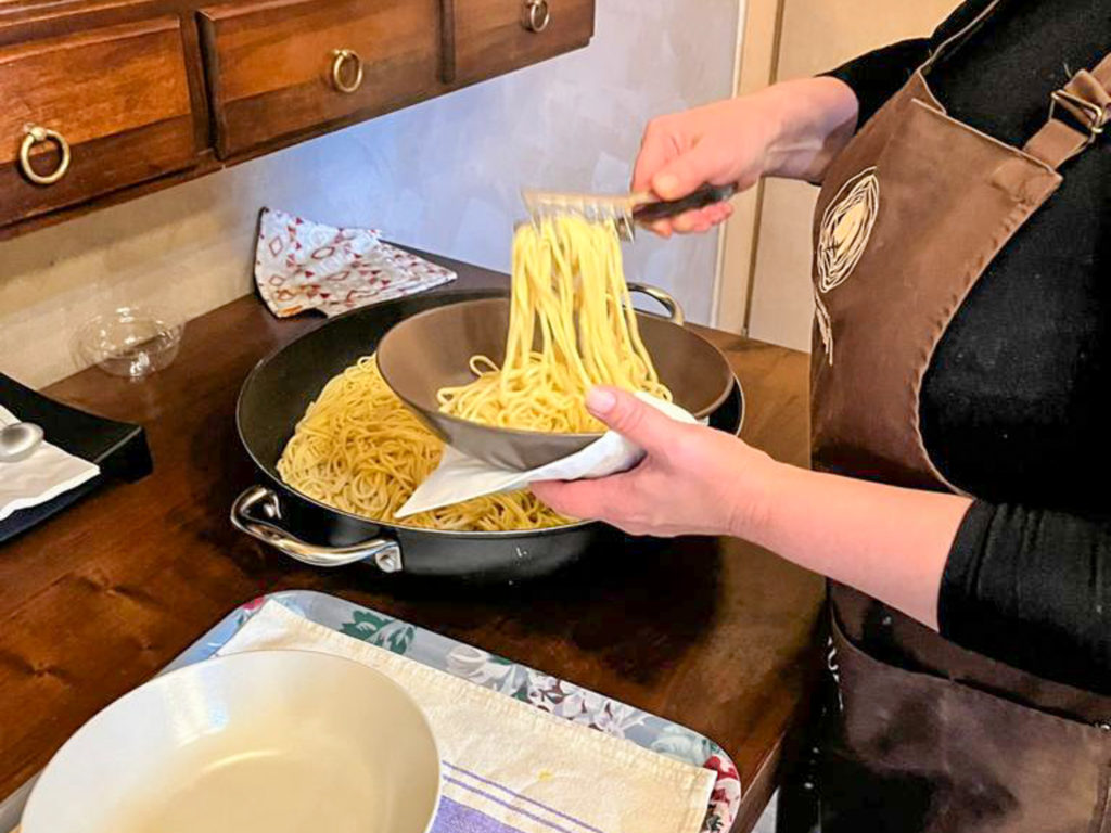 Cooking pasta to serve with truffles. Copyright@2022 reserved to photographer via mapandfamily.com