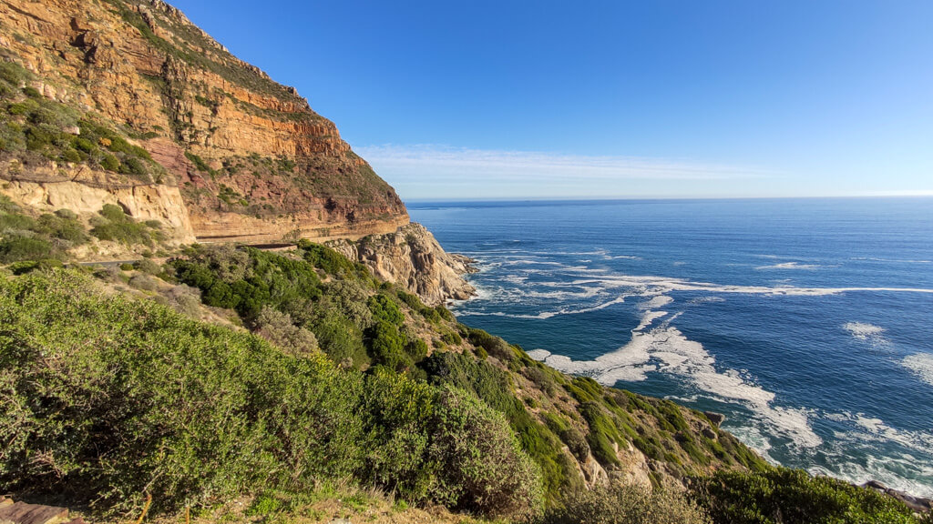 A view of the sea from the roadside on Chapman's Peak Drive. Copyright@2023 reserved to photographer via mapandfamily.com