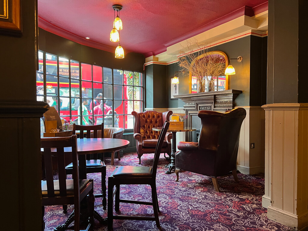 Comfy armchairs in the bay window at the front of the Goat Tavern. Copyright@2023 mapandfamily.com