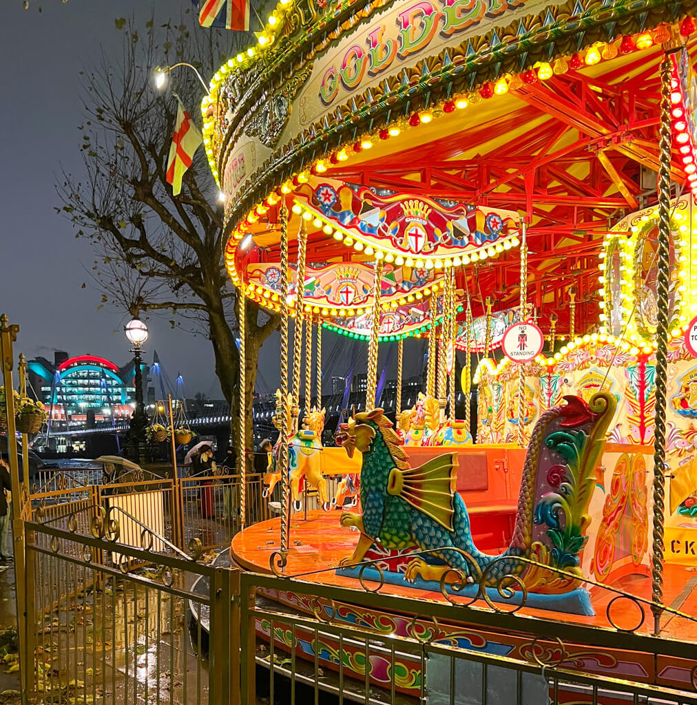 Retro carousel beside the river. Copyright@2023 mapandfamily.com