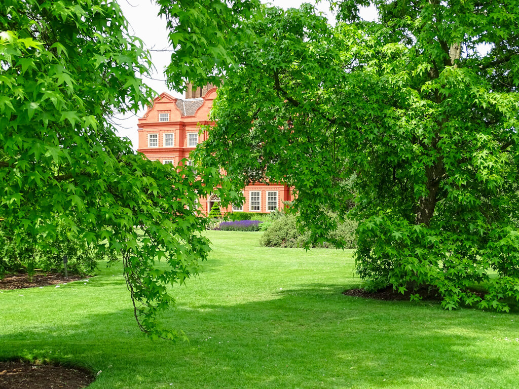 Good weather in London for June as trees cast shadows over the lawns at Kew Gardens. Copyright@2024 Nancy Roberts