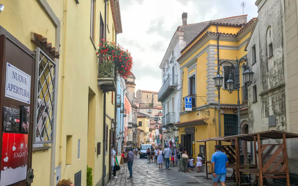 Historic centre of Maratea with pastel painted buildings and iron street lamps. Copyright@2024 reserved to the photographer via mapandfamily.com 